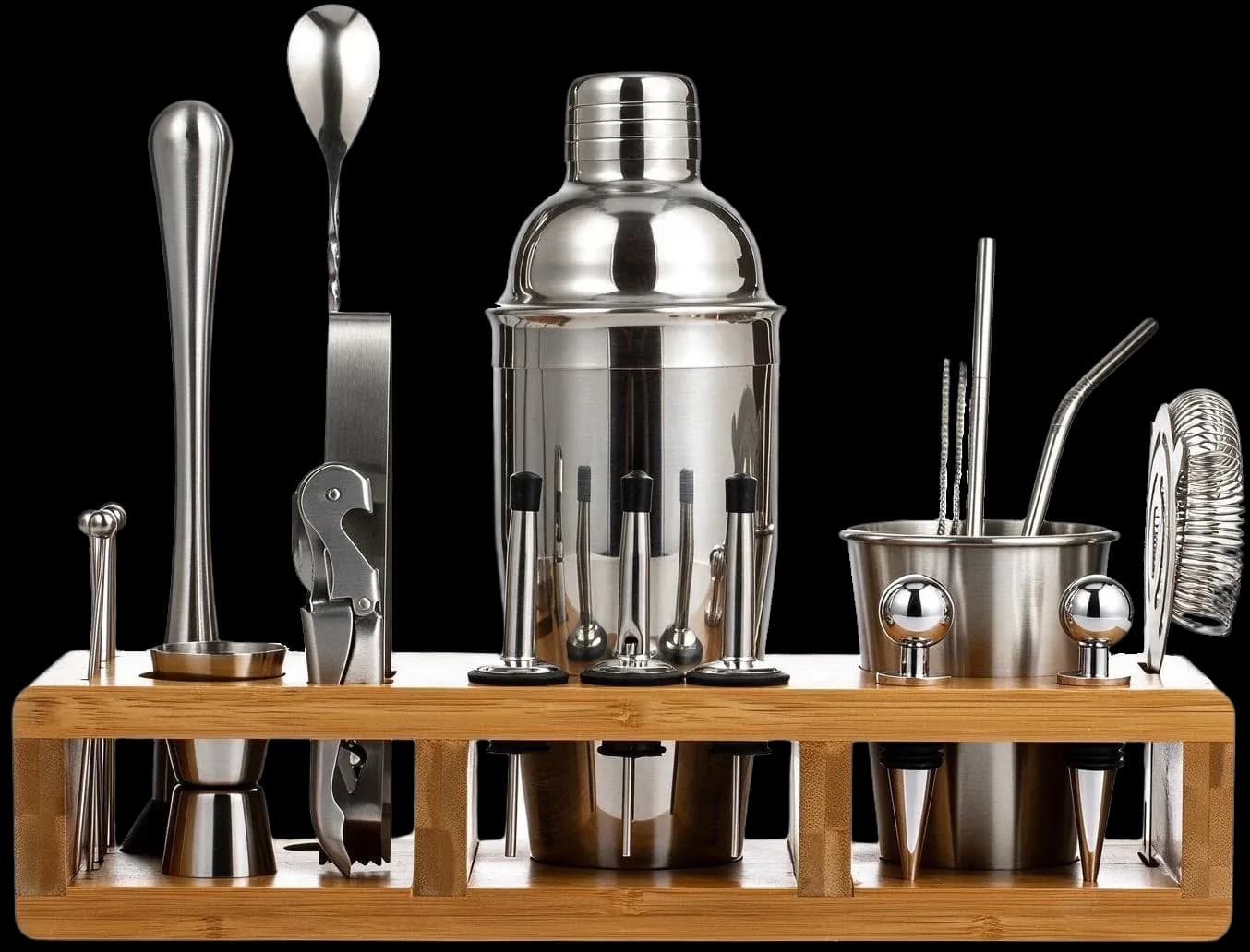 Stainless steel cocktail tools displayed on a bamboo stand